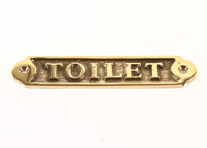 Mässingskylt Toilet